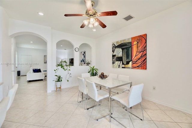 dining area with light tile patterned floors, baseboards, visible vents, and recessed lighting