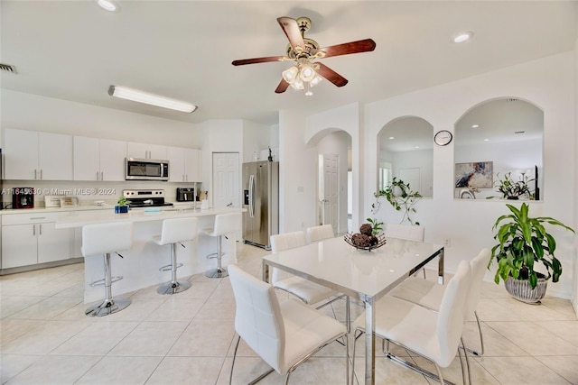 dining space featuring recessed lighting, visible vents, and light tile patterned floors