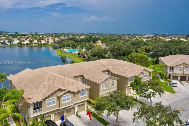 aerial view featuring a water view