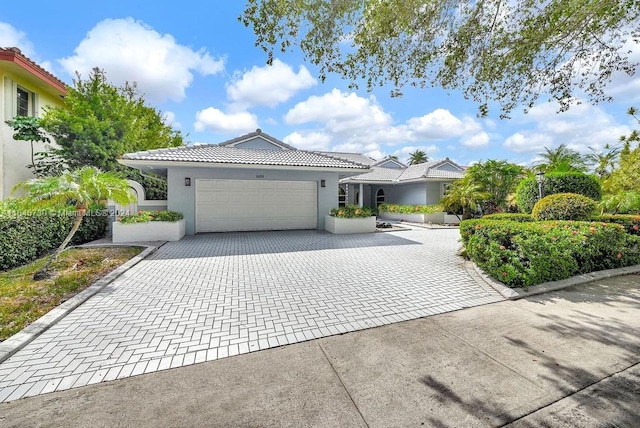 view of front of home with a garage