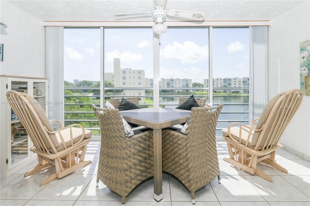 sunroom / solarium with ceiling fan