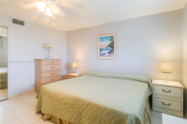 bedroom featuring ceiling fan and light tile patterned floors