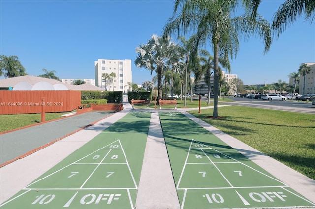 view of home's community featuring a yard