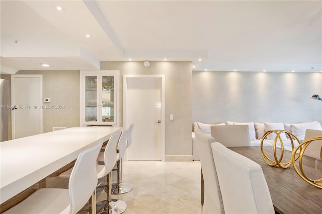 kitchen featuring light tile patterned flooring