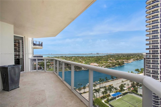 balcony featuring a water view