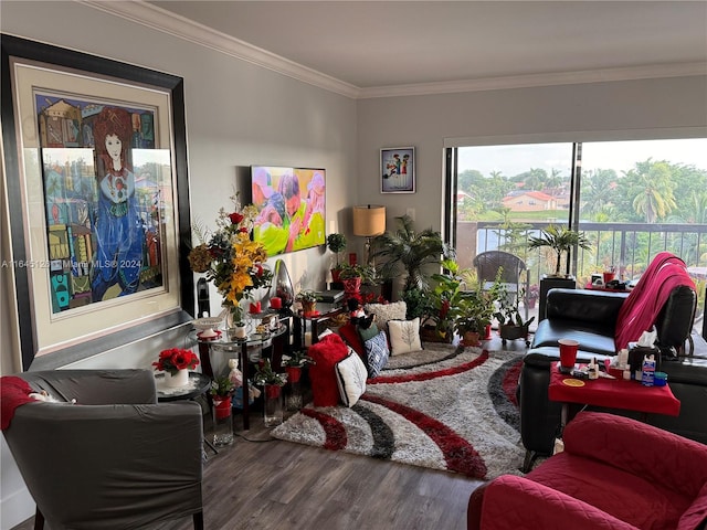 living room with ornamental molding and wood-type flooring