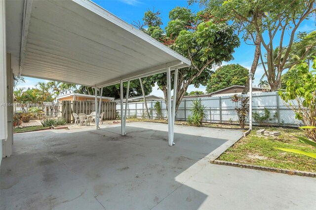 4296 E 9th Ln, Hialeah, FL 33013 - fenced backyard featuring a patio area