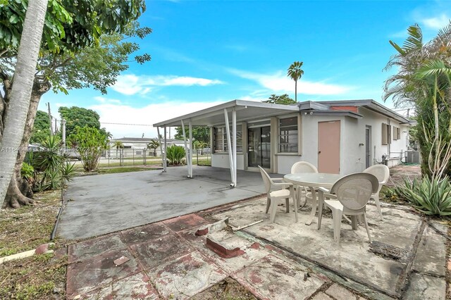 view of patio with central AC unit