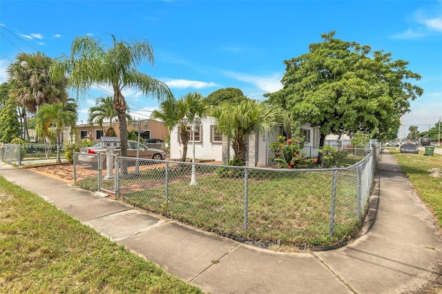 view of front of property with a front lawn