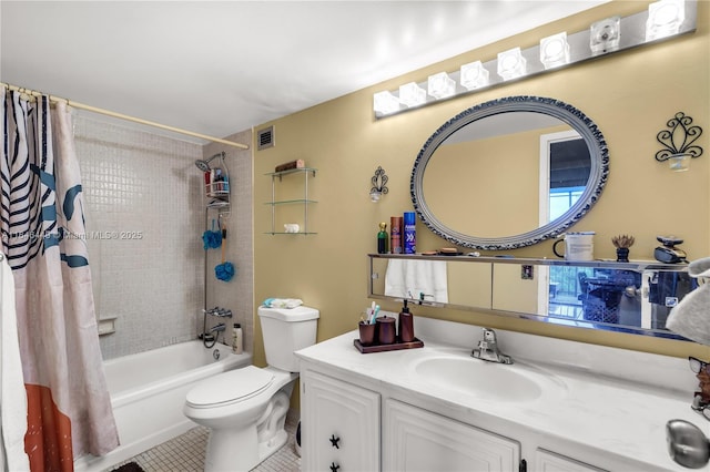 full bathroom with tile patterned flooring, shower / bath combo, vanity, and toilet