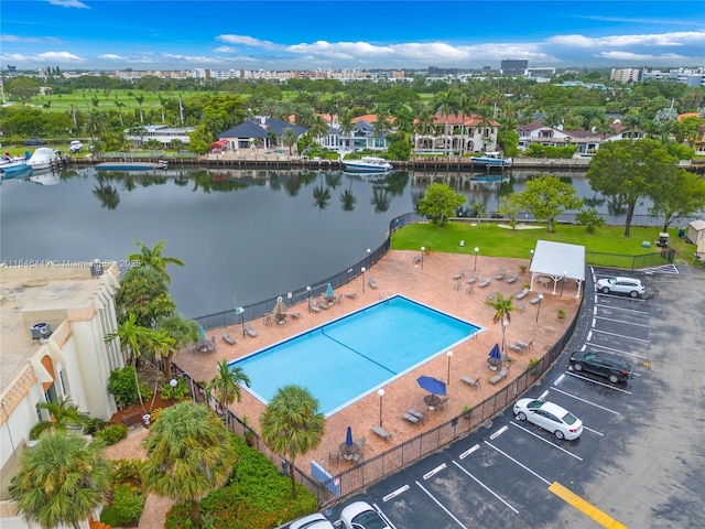 birds eye view of property featuring a water view