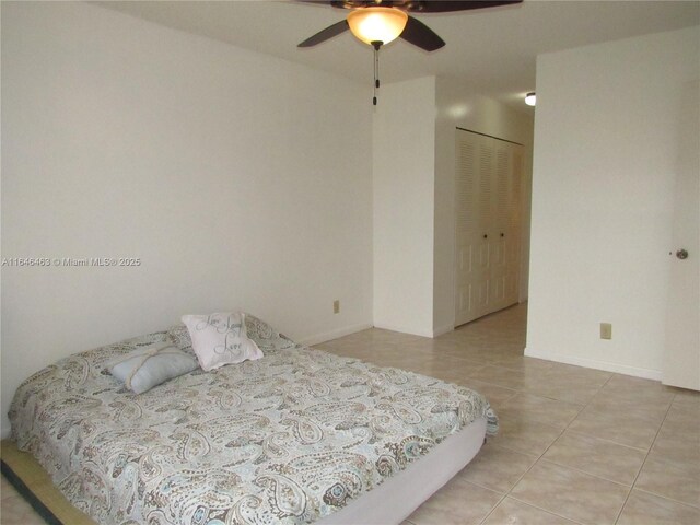 bedroom featuring light tile patterned floors