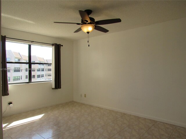 bedroom with ceiling fan and light tile patterned floors