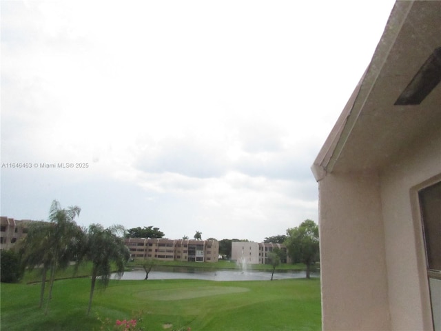 view of yard with a water view