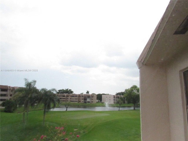 view of yard with a water view