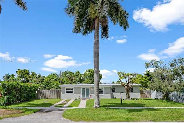 view of front of property with a front lawn