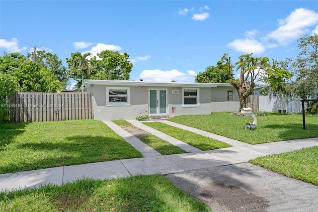 view of front facade featuring a front yard