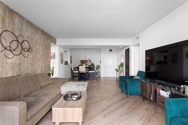 living room with light hardwood / wood-style floors