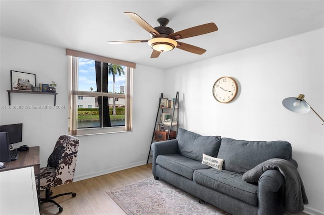 office area featuring ceiling fan and light hardwood / wood-style flooring