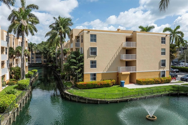 view of property with a water view