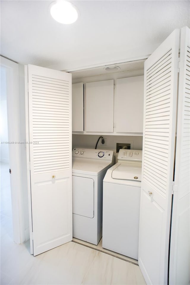 laundry room with separate washer and dryer