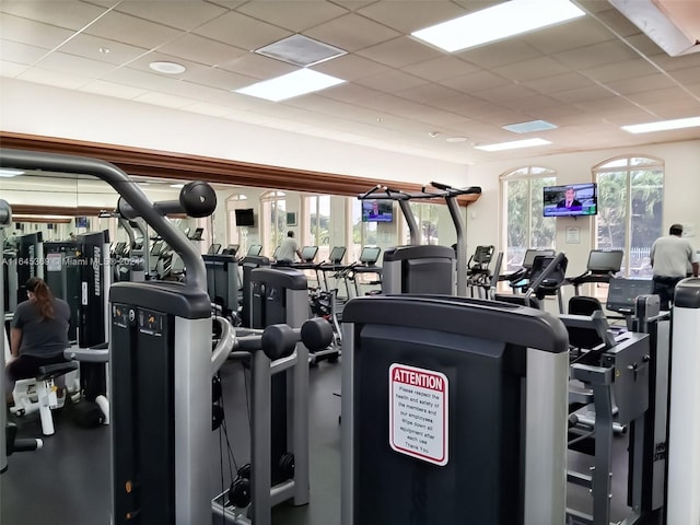 workout area featuring a drop ceiling