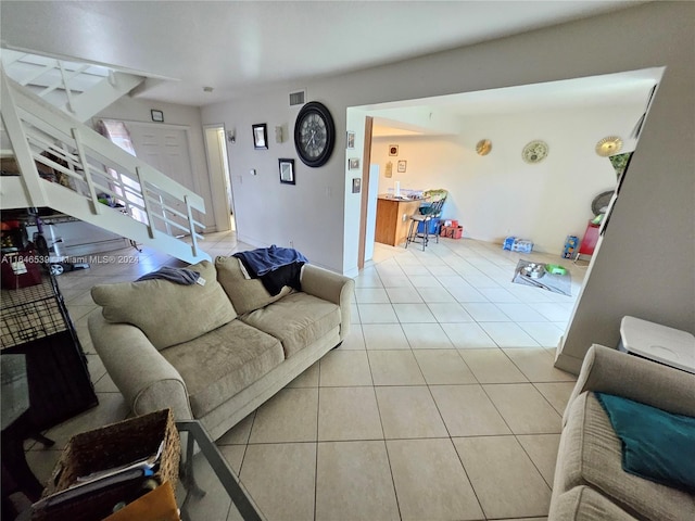 living room with light tile patterned floors