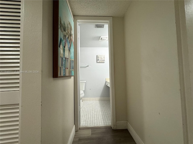 hall featuring dark wood-type flooring