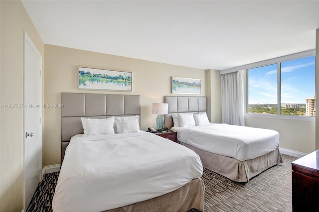 bedroom featuring baseboards