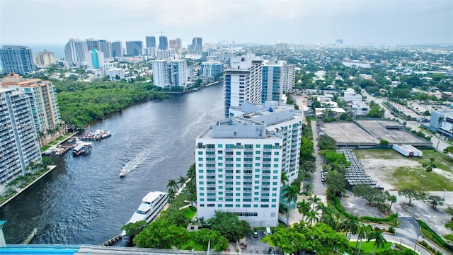 bird's eye view featuring a water view and a city view