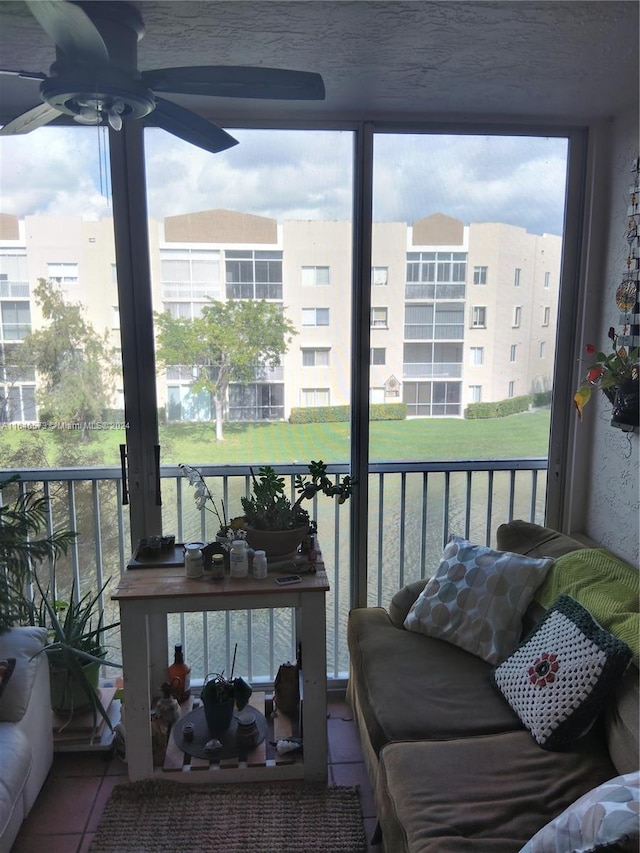 balcony featuring ceiling fan