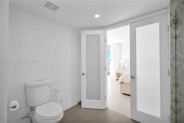 bathroom featuring toilet