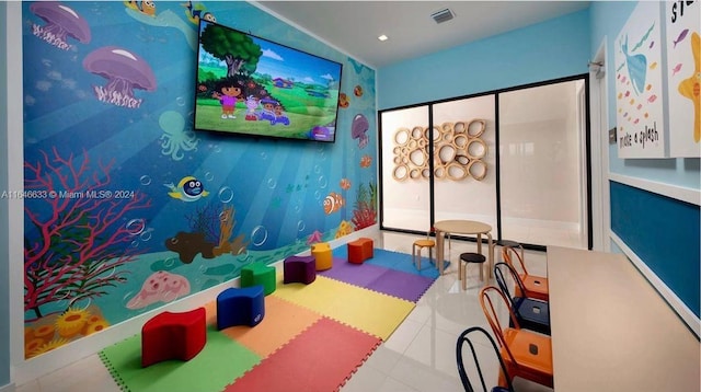 playroom with tile patterned flooring