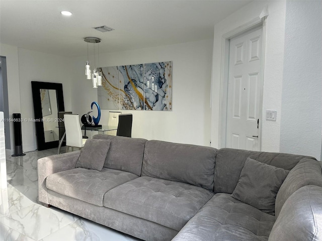 living room featuring light tile patterned flooring