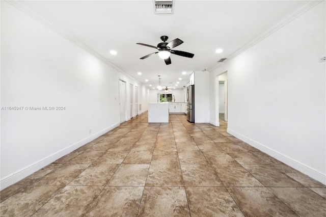 interior space with ceiling fan, light tile patterned floors, and crown molding