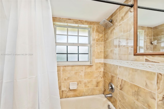 bathroom featuring shower / bath combination with curtain