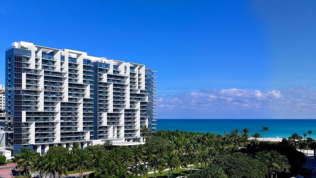 view of building exterior featuring a water view