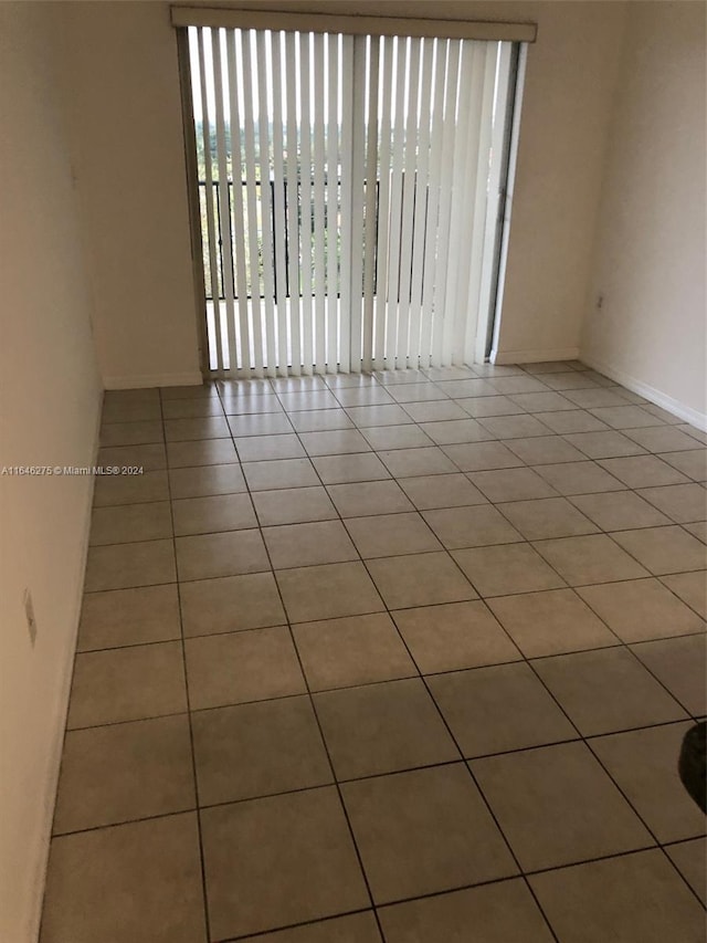 view of tiled spare room