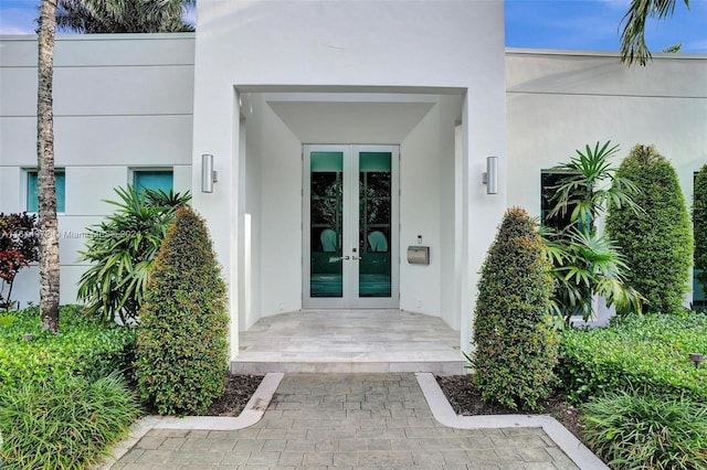 property entrance featuring french doors