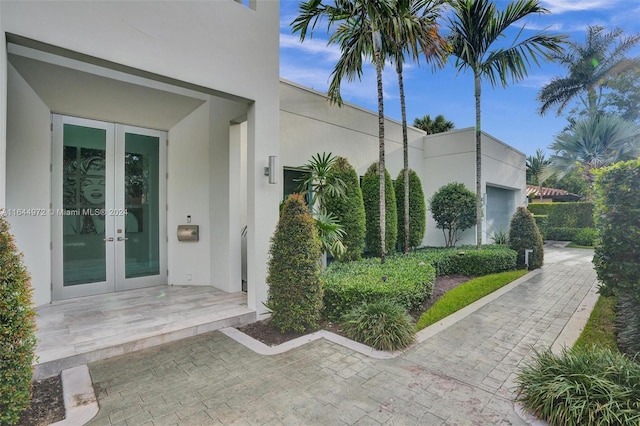 property entrance featuring french doors