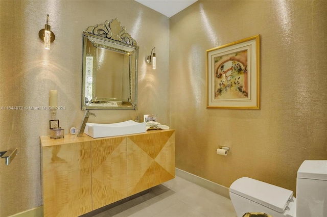 bathroom with vanity and toilet