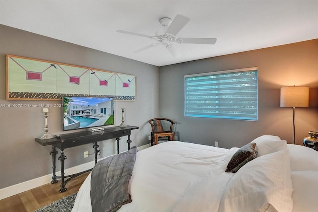 bedroom featuring wood-type flooring and ceiling fan