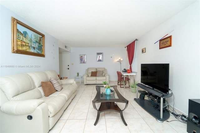 living room featuring light tile patterned flooring