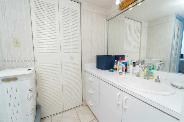 bathroom featuring tile patterned floors and vanity