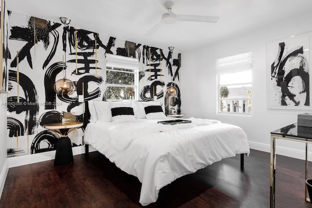 bedroom featuring ceiling fan and wood-type flooring