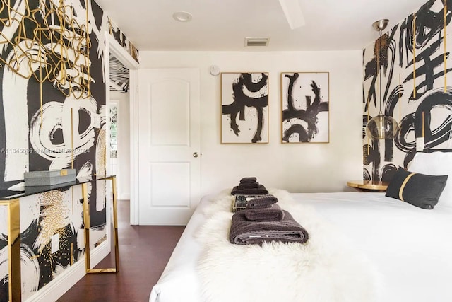 bedroom featuring dark hardwood / wood-style floors