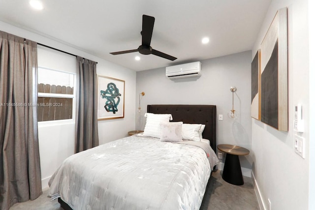 bedroom with ceiling fan and a wall unit AC