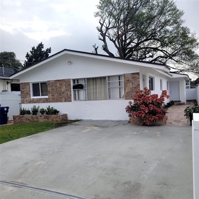 view of front of home featuring stone siding