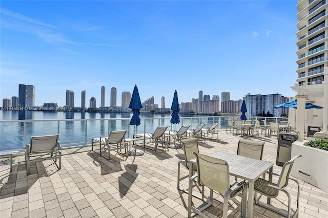 view of patio featuring a water view