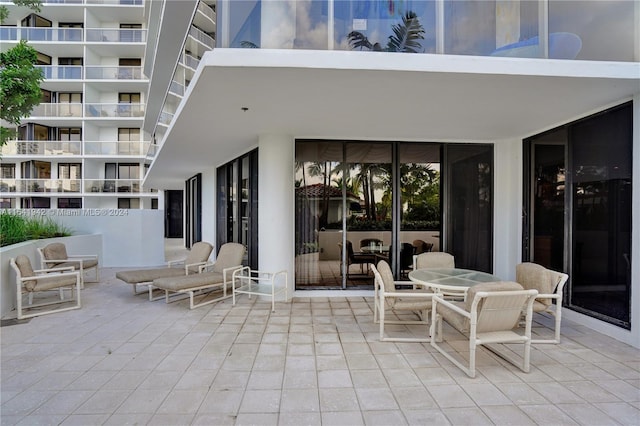 view of patio / terrace featuring a balcony